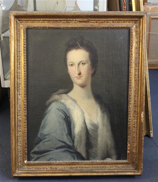 Early 18th Century English School Portrait of a lady wearing a blue dress and pearls in her hair 27 x 21in.